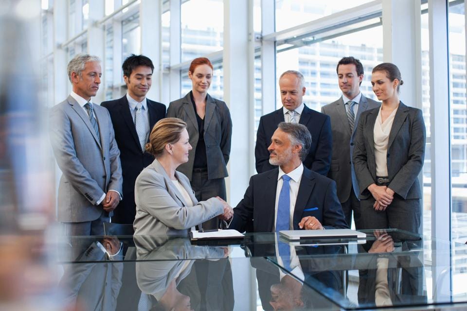 Two people shaking hands